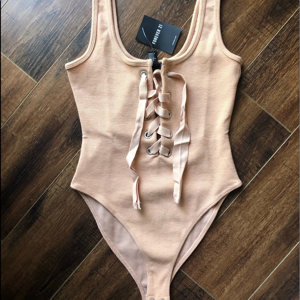 Adorable laced up bodysuit